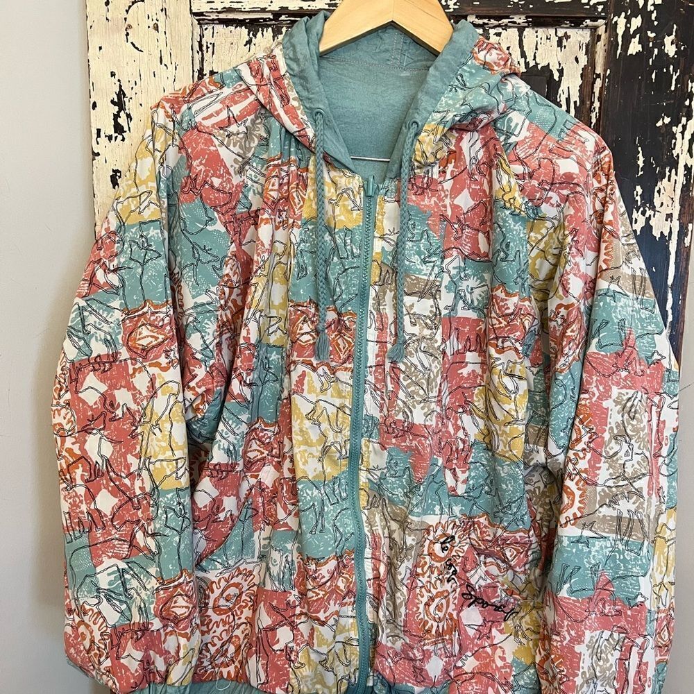 Rare women’s retro Le Coq sportif reversible hooded jacket.
